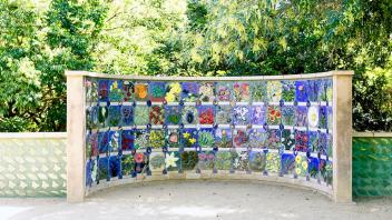 people viewing the nature's court tiles