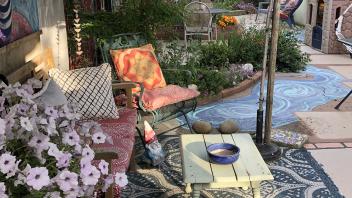 Tucker Backyard after renovation with shaded outdoor seating area