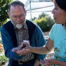 Dr. Lisa Tell with community member Donald Stoye