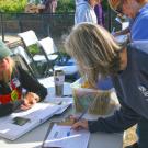 Image of individual signing up for membership with the Friends of the UC Davis Arboretum and Public Garden.